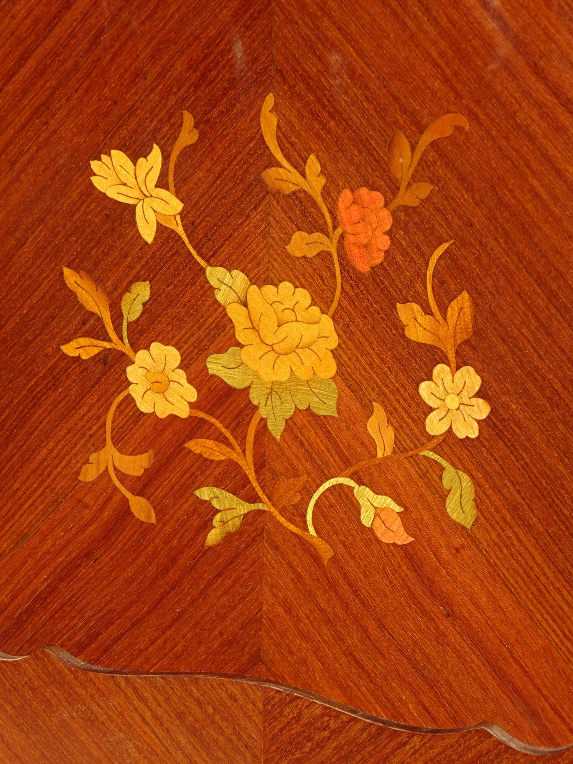 Glass library with rosewood marquetry in the Louis XV style.