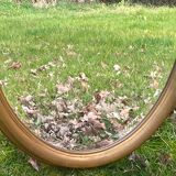 Miroir ovale doré biseauté, 79 x 59 cm