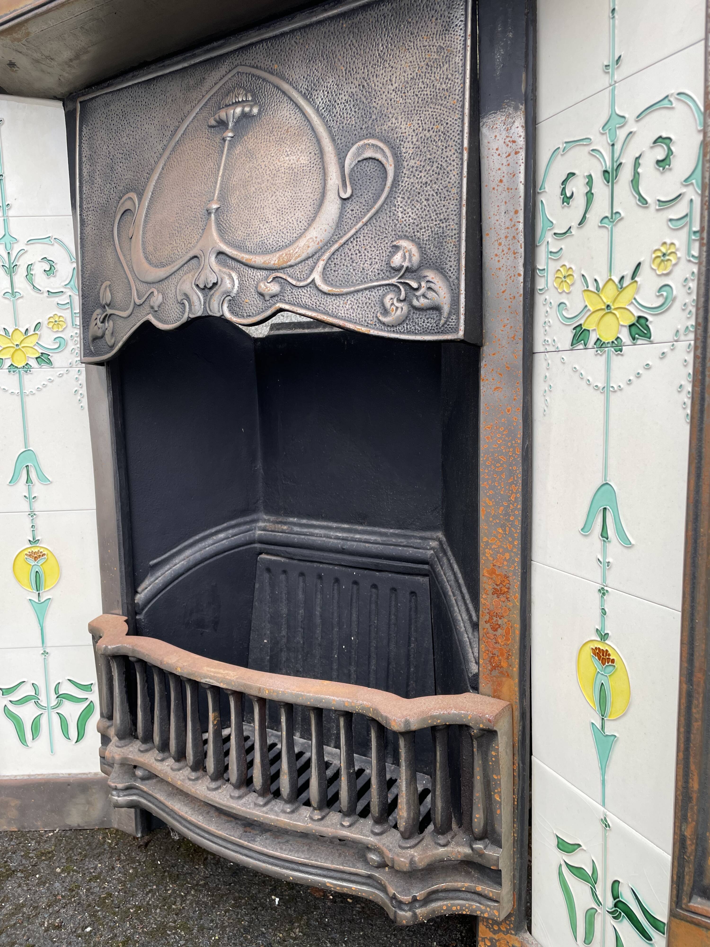 Open cast iron fireplace, Art Nouveau style