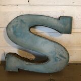 Blue sign letter "S"