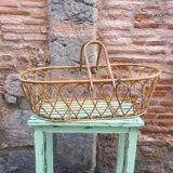 Rattan bassinet with hood arches