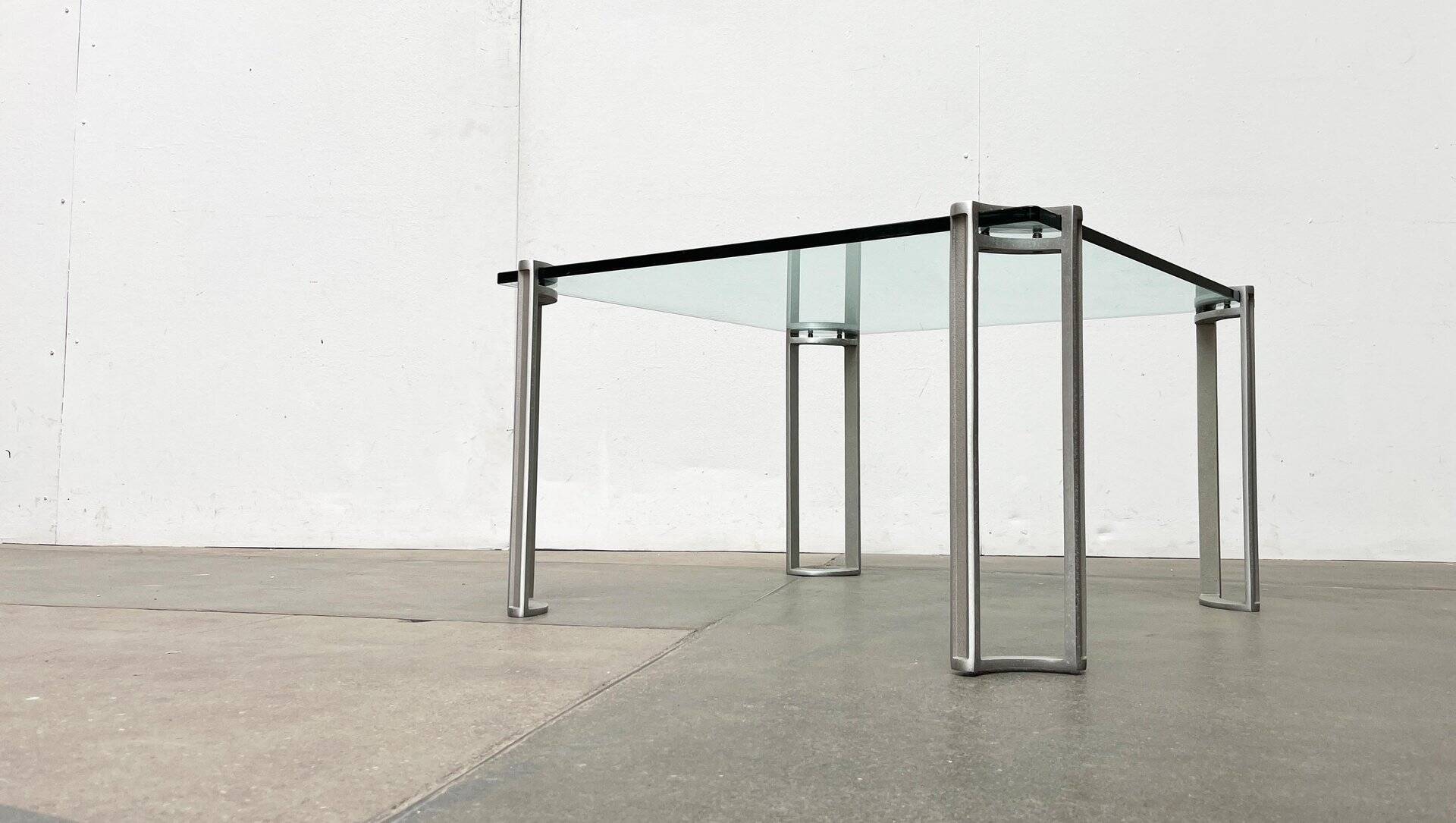 Vintage Space Age coffee table in glass and aluminium attributed to Peter Ghyczy, 1970s.