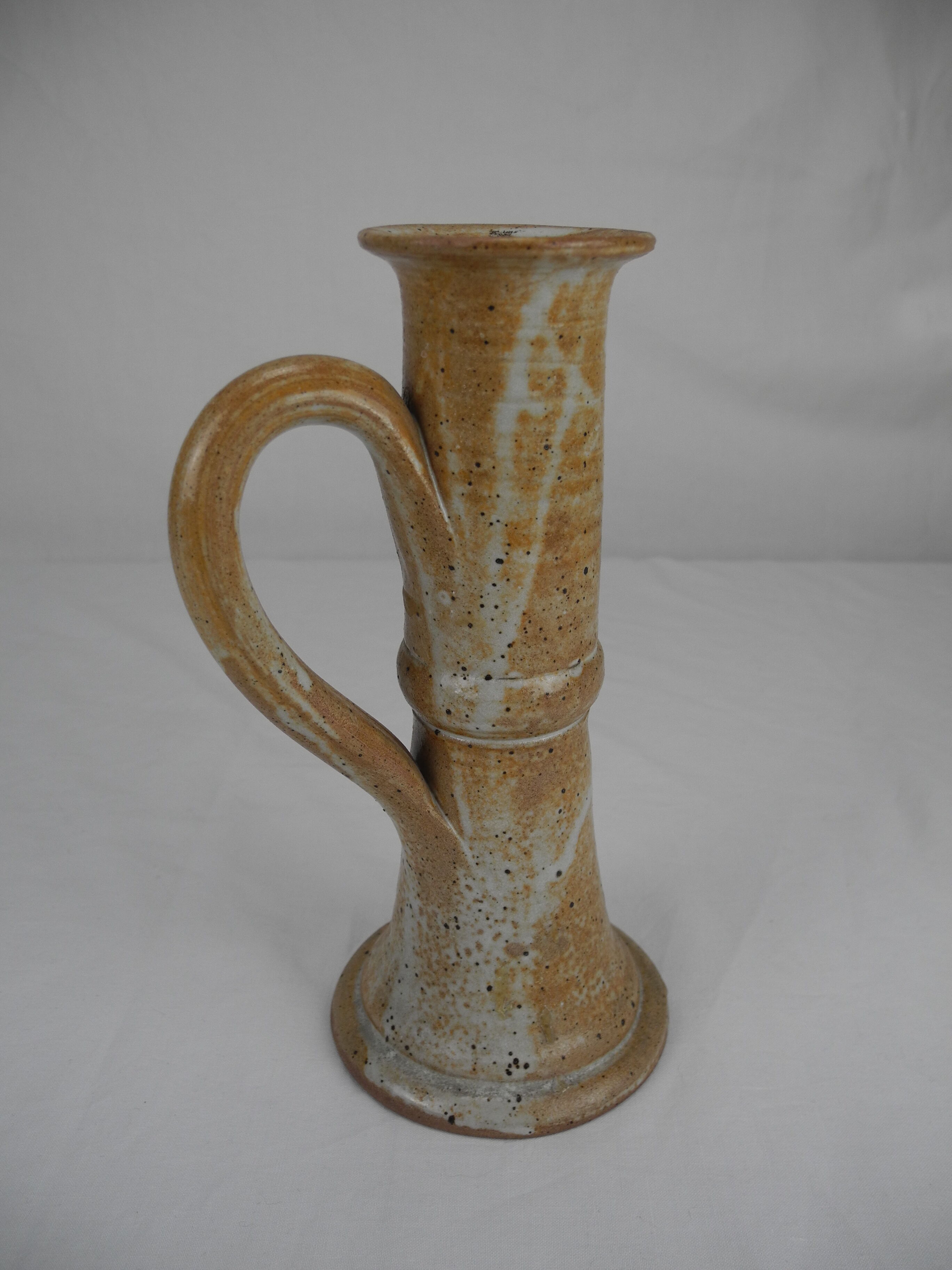 Old vintage stoneware candle holder
