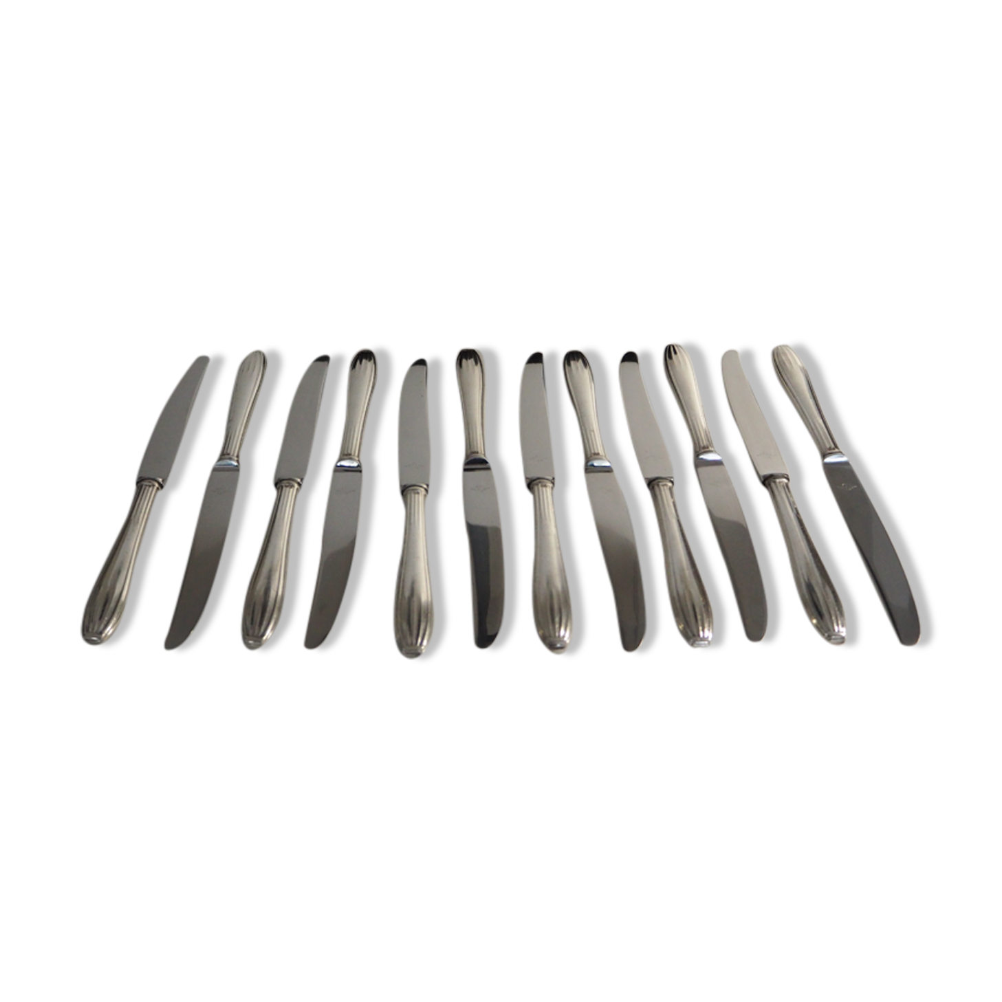 12 SFAM cheese knives in its dark chocolate case