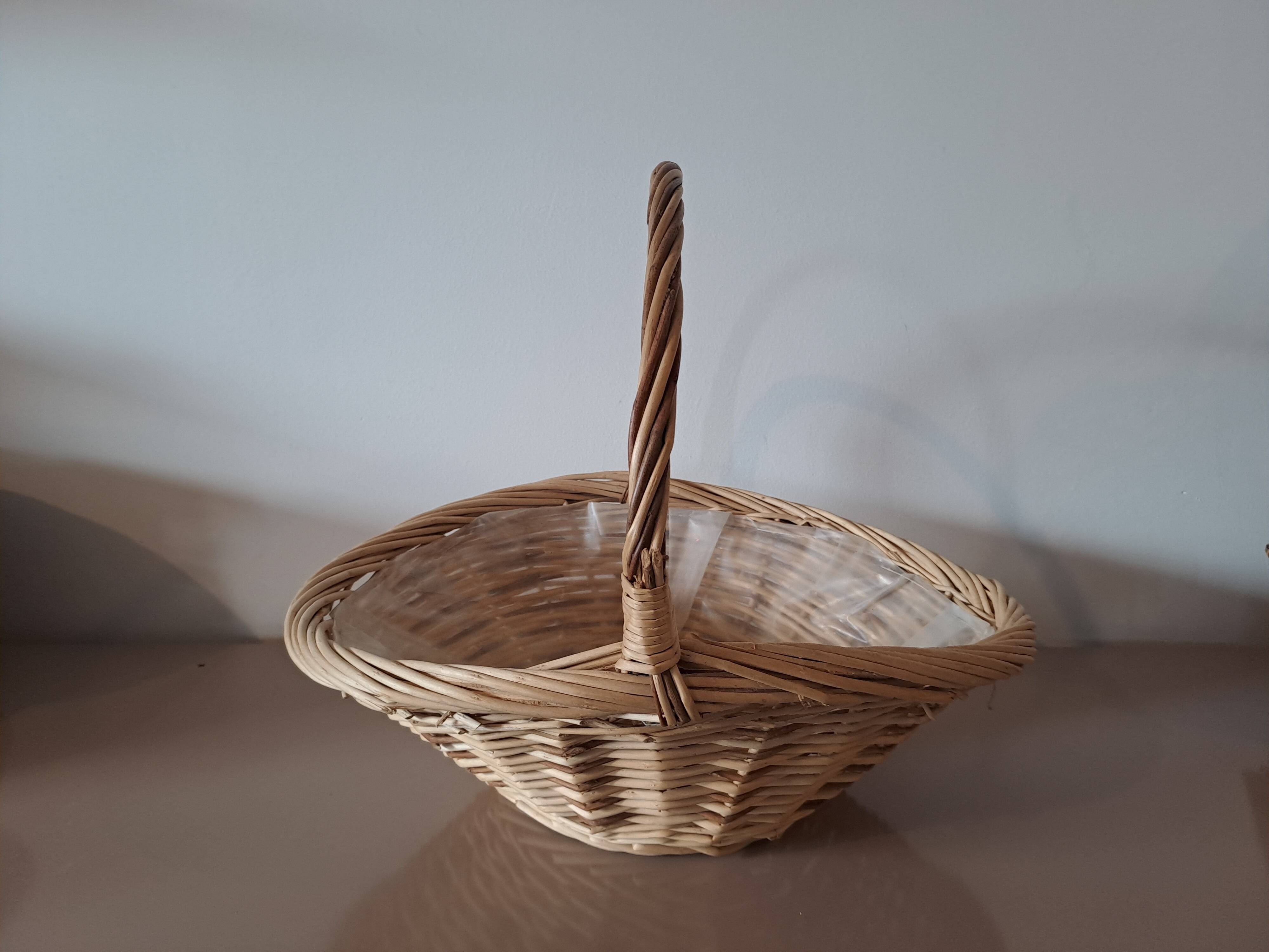 Natural wicker basket with twisted handle – vintage decorative basket
