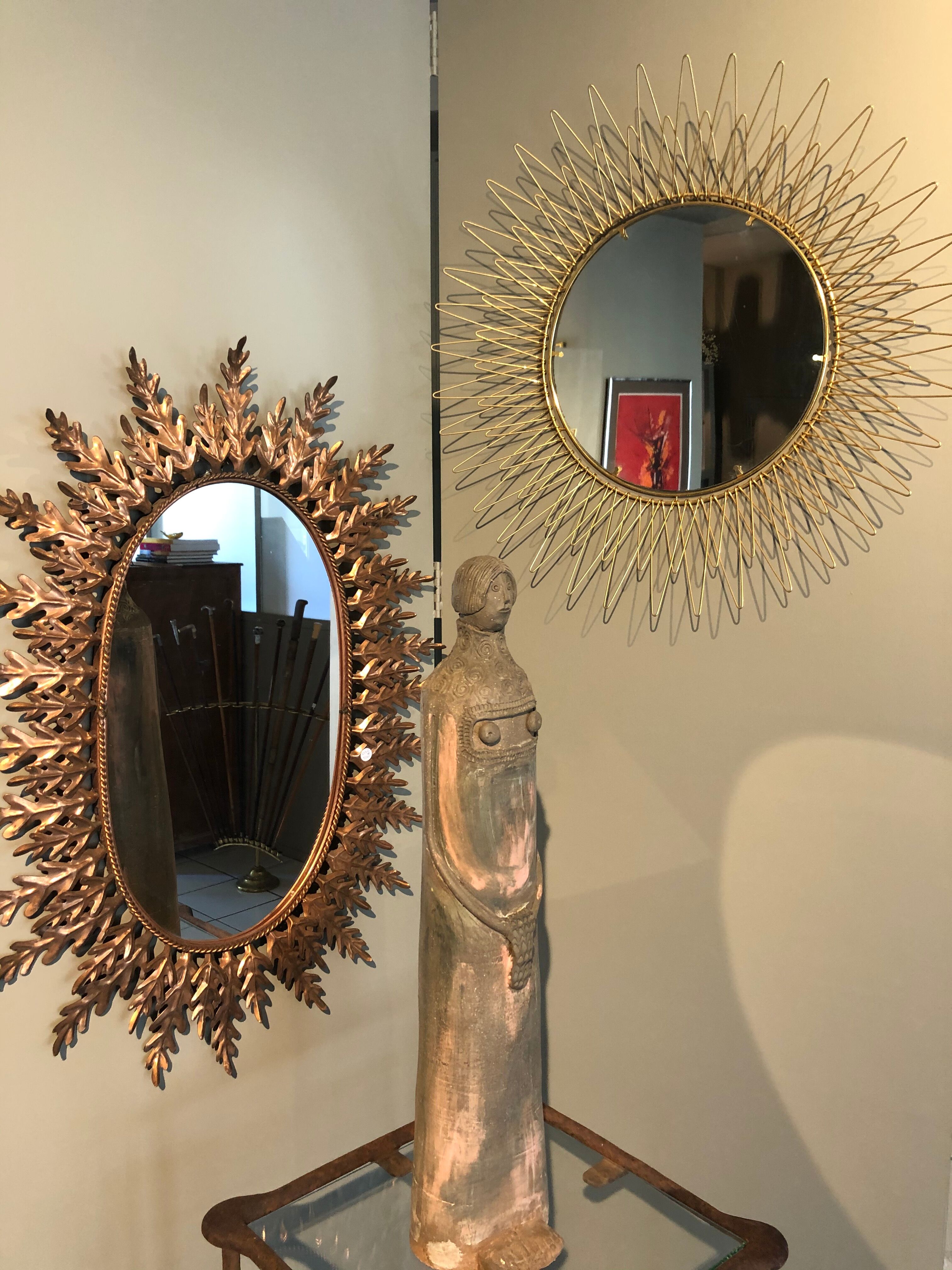 Golden brass sun mirror