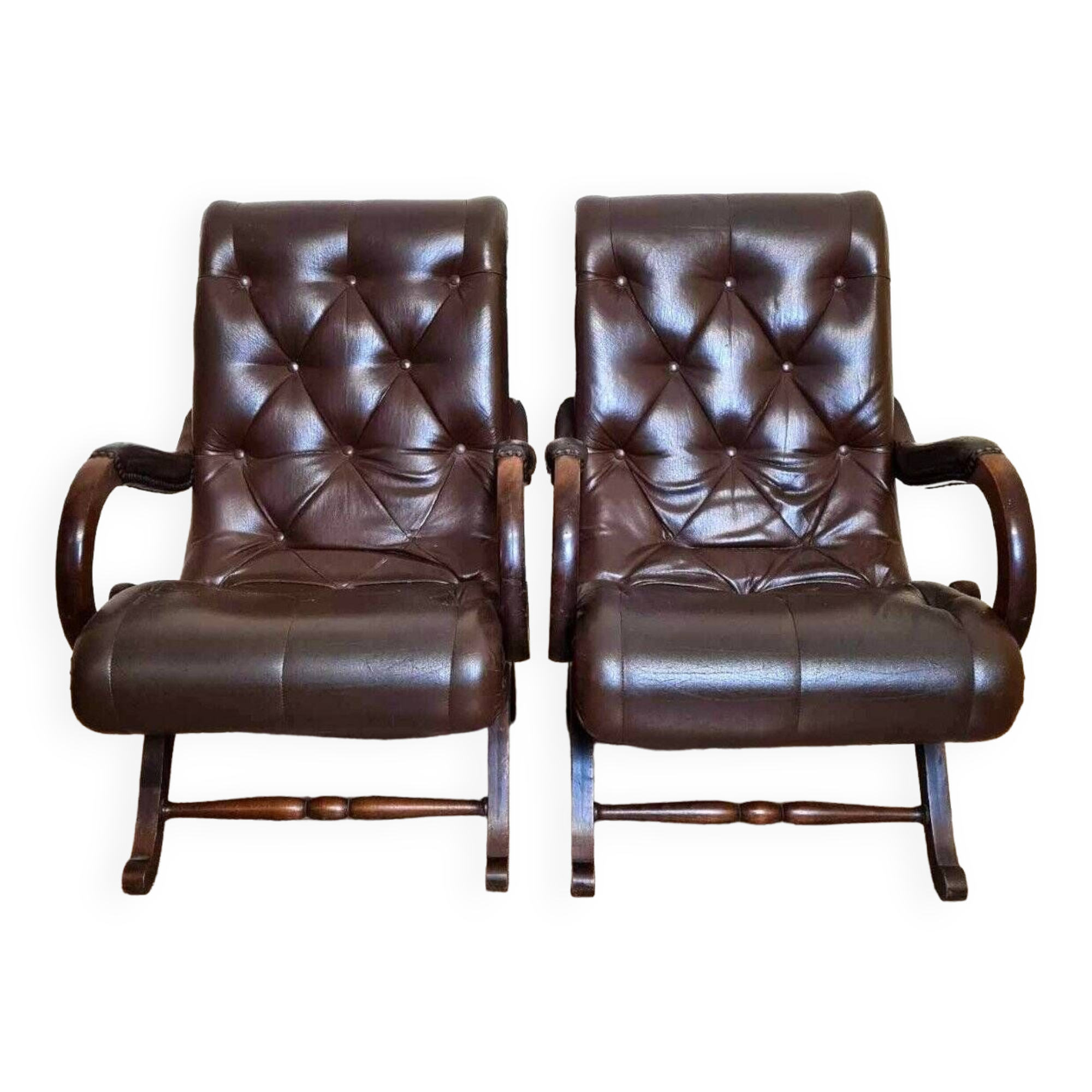 Pair of leather chesterfiel armchairs