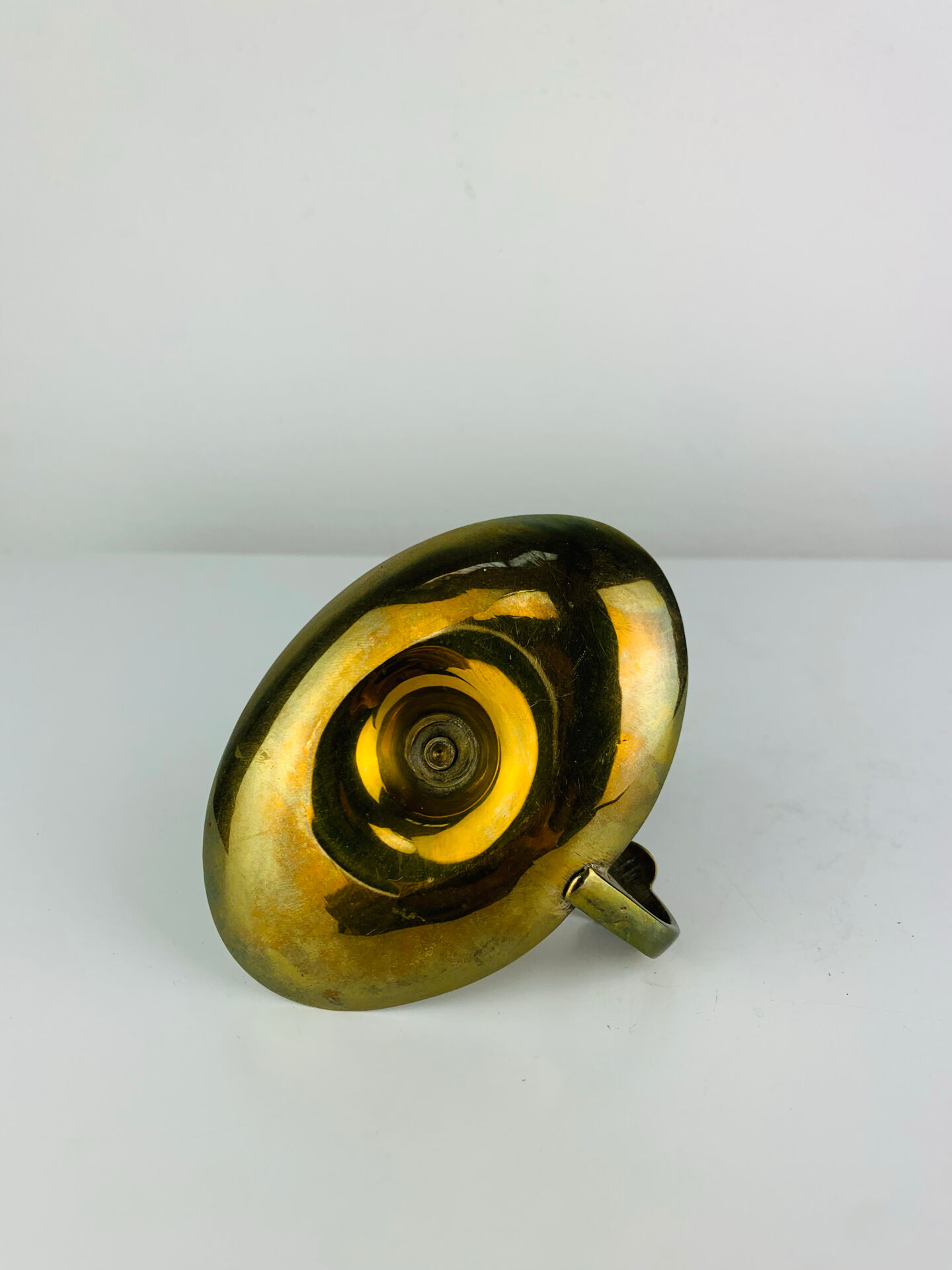 Vintage brass candlestick, rat of the cellar.