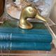 Décapsuleur "canard" en laiton doré vintage