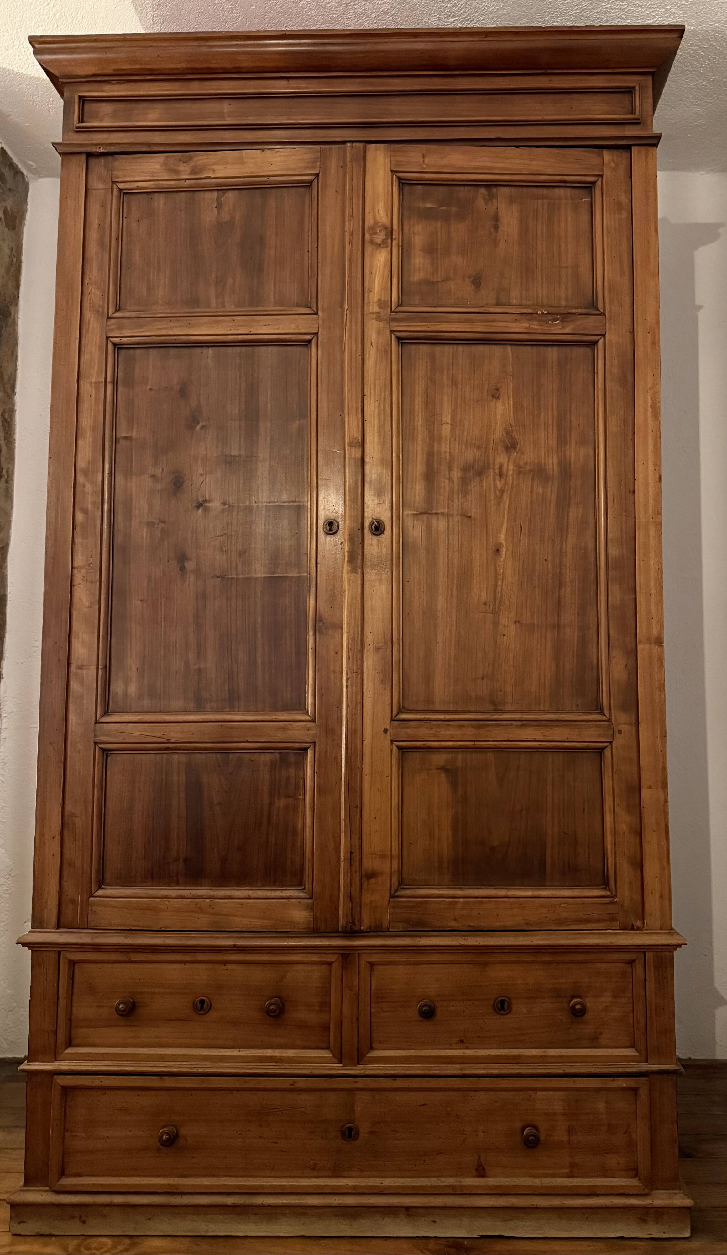 Antique solid wood wardrobe, rustic, with drawers and original key.