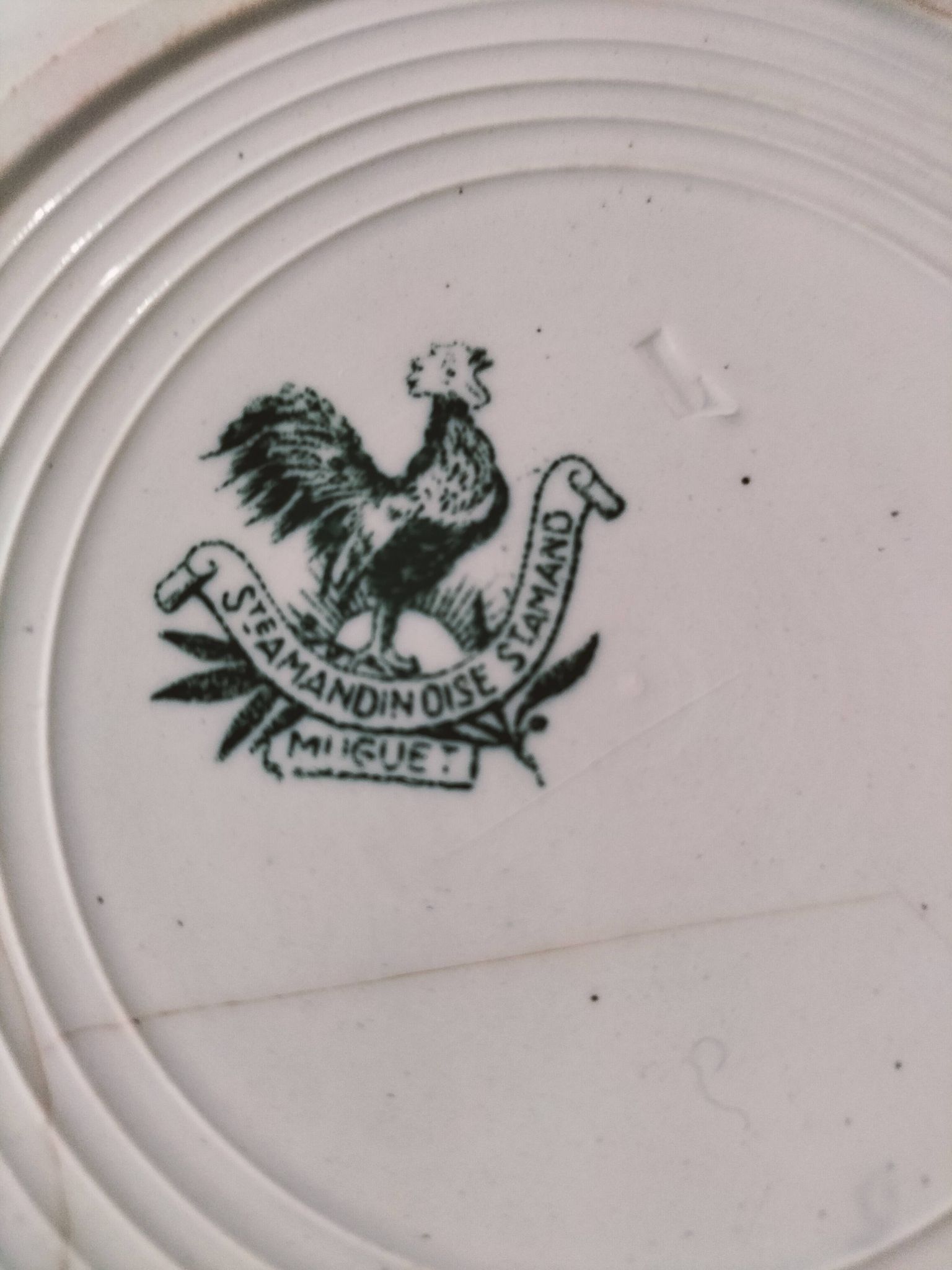 Antique plate Faïencerie Saint-Amandinoise model Muguet from the 1900s