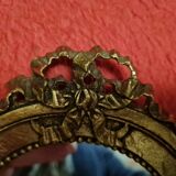 Petit miroir bois doré sculpté