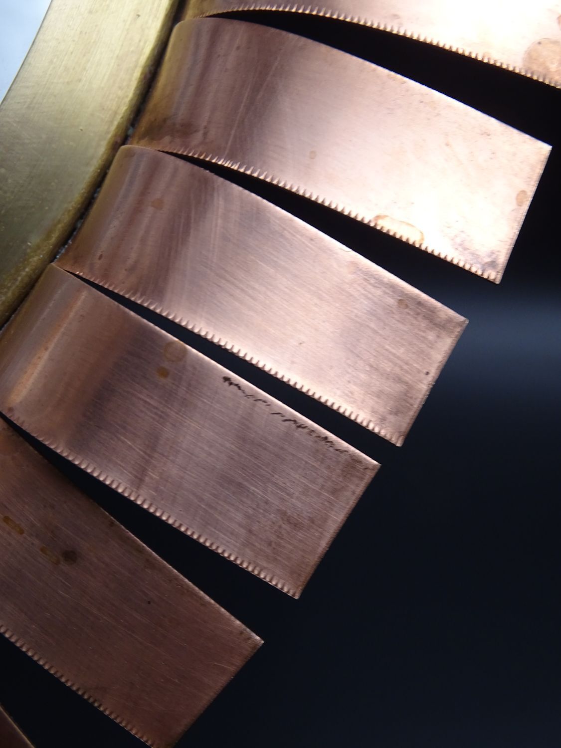 Round mirror in cut copper, sun-shaped  1970