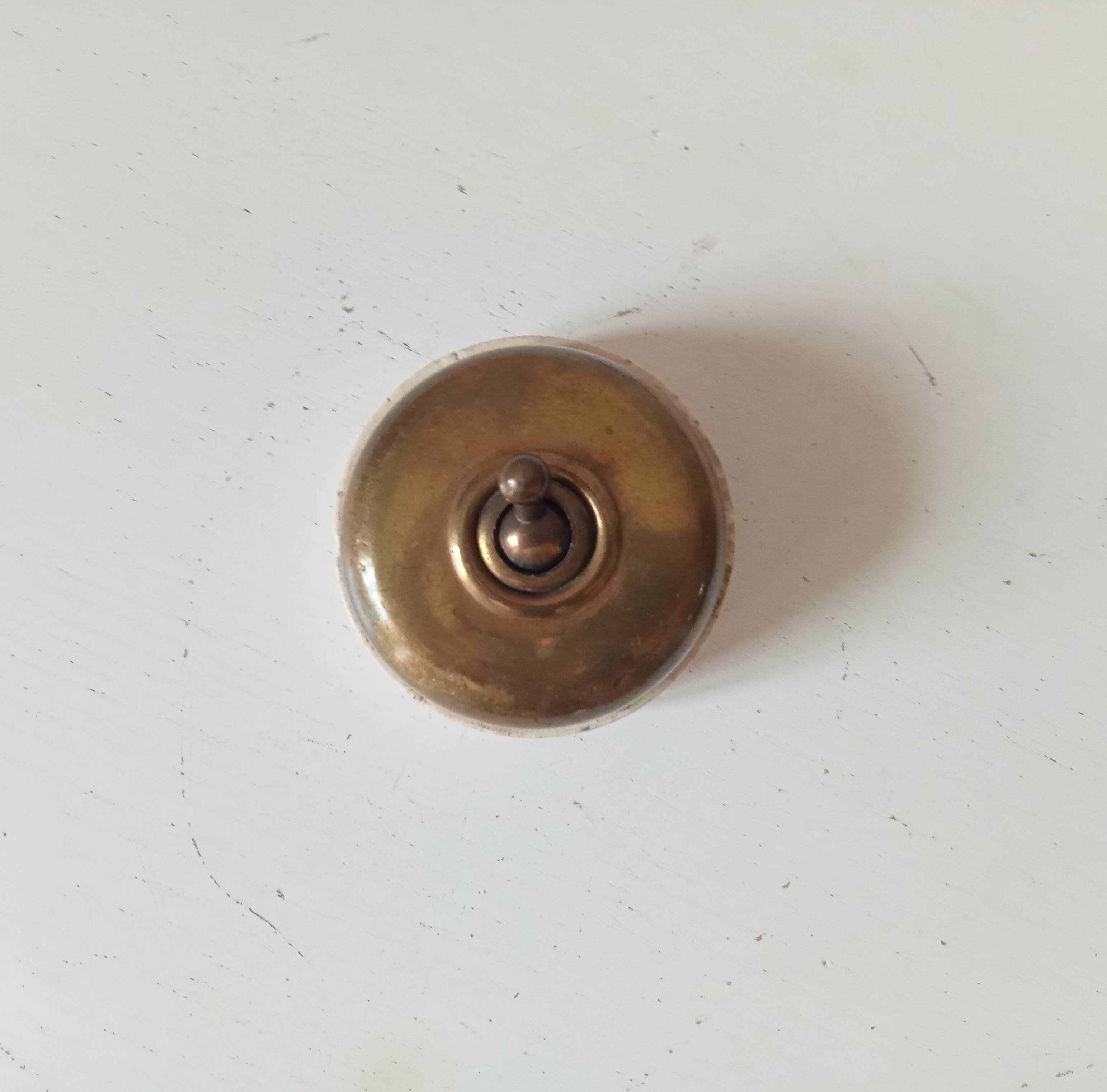 Antique brass and porcelain switch from the 40s/50s