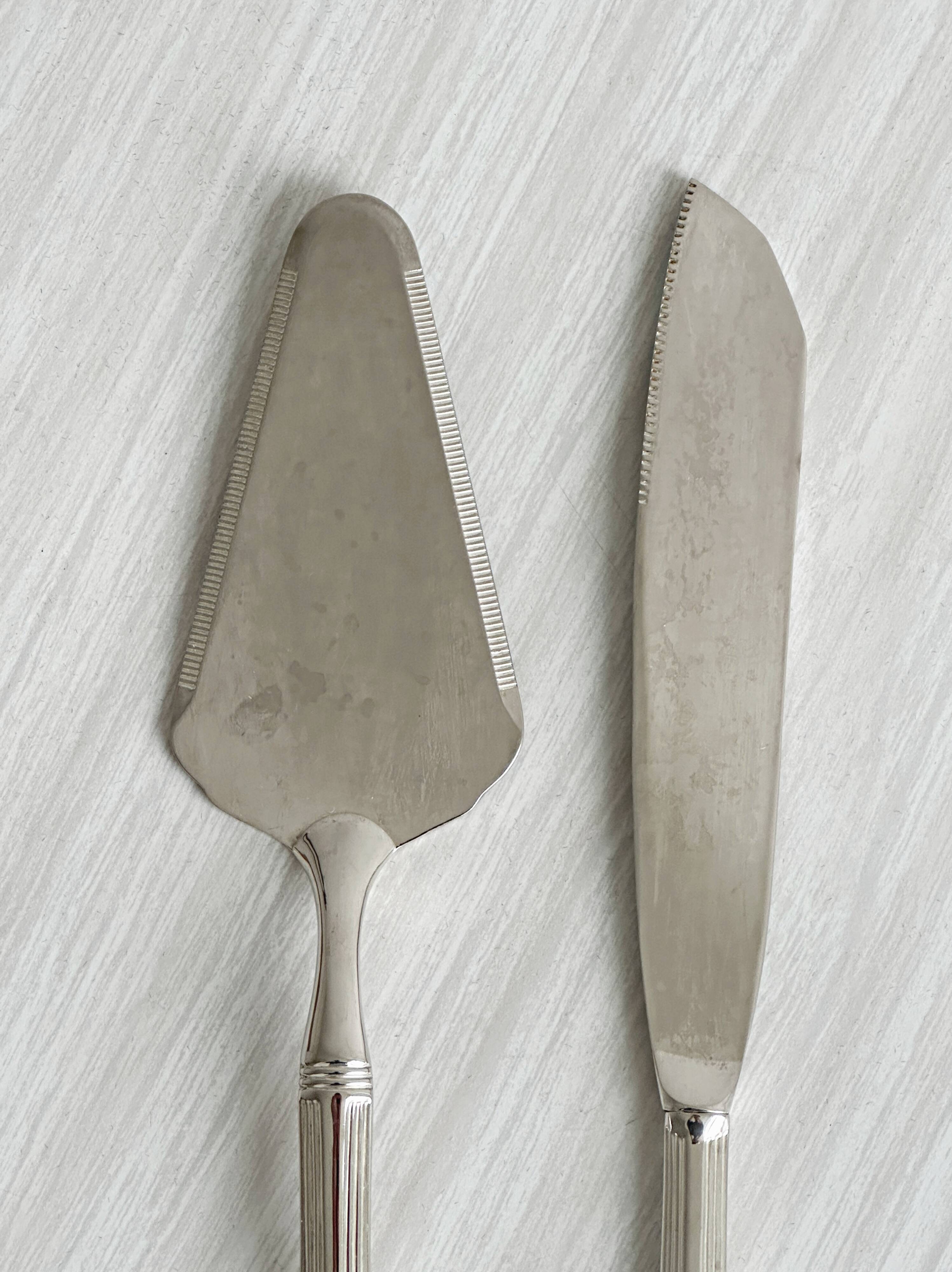 Antique patinated metal serving cutlery