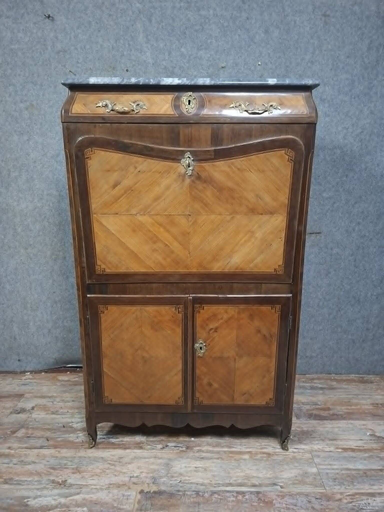 Louis XV period secretary in marquetry and veneer, 18th century.
