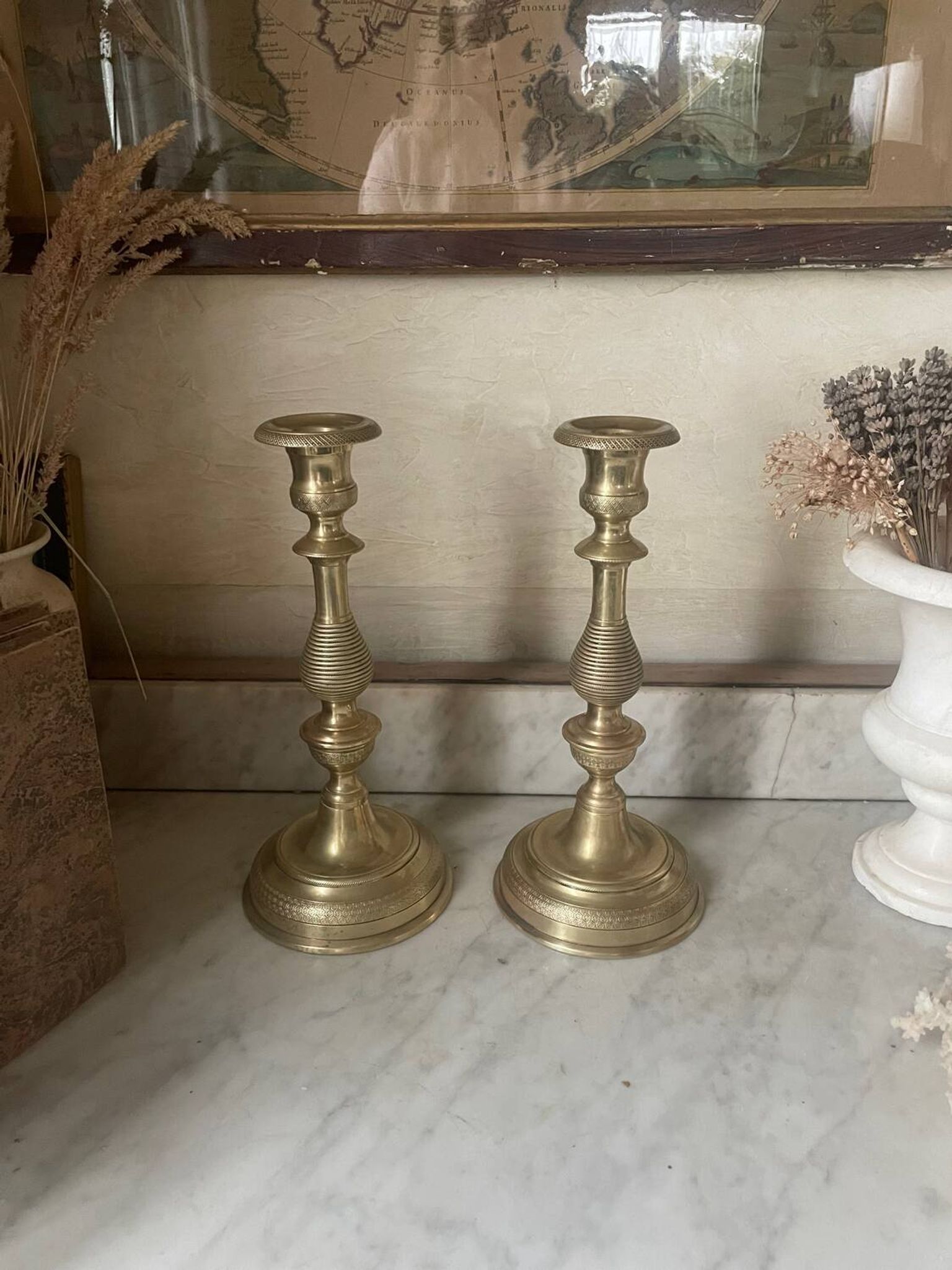 Antique pair of gilded bronze candlesticks