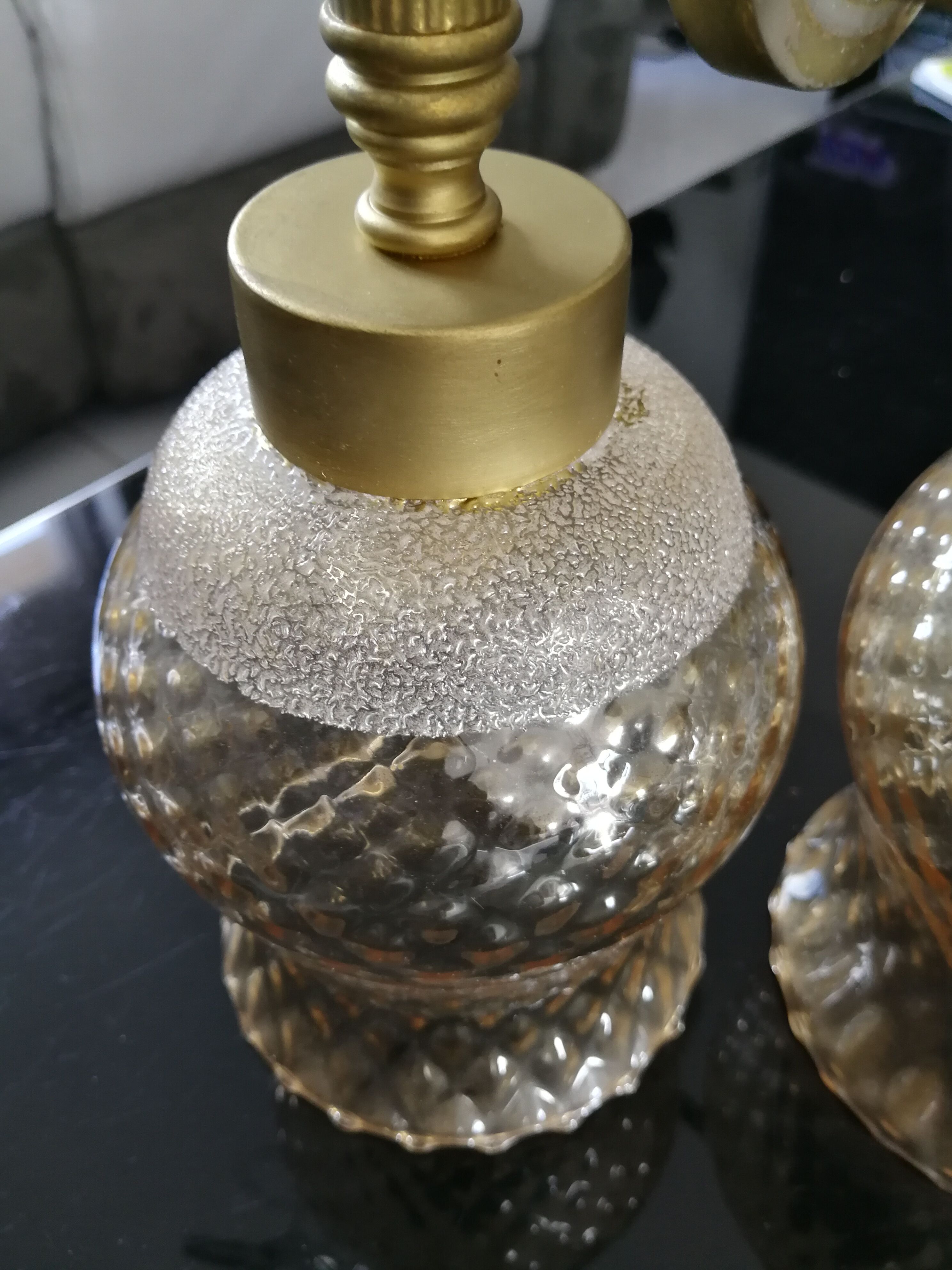 Glass and brass sconces