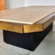 Coffee table in brass and travertine.