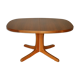 Walnut oval table with extension cords