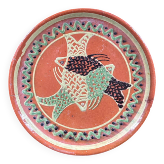Large handmade dish with fish decoration