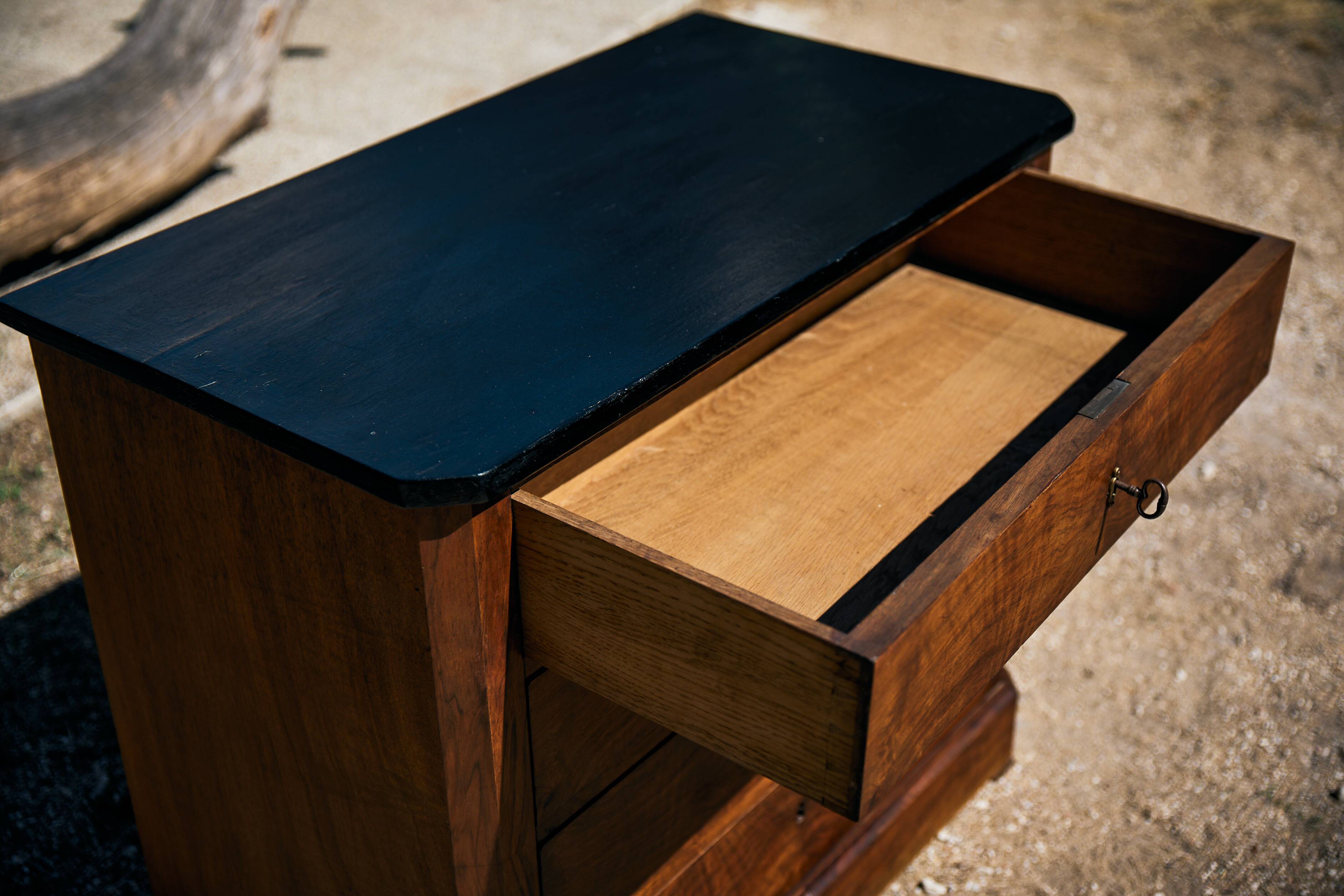 Small Louis-Philippe chest of drawers with four drawers, black top.