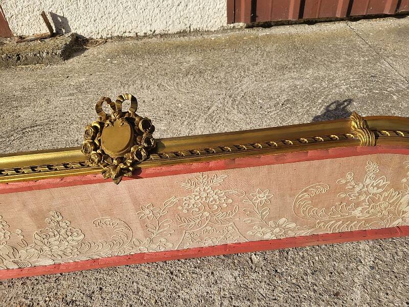 Old bed canopy in yellow copper and bronze