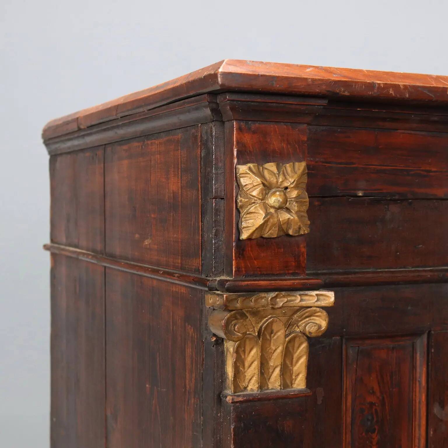 Antique walnut and fir wardrobe with drawers, Italy, 18th century.