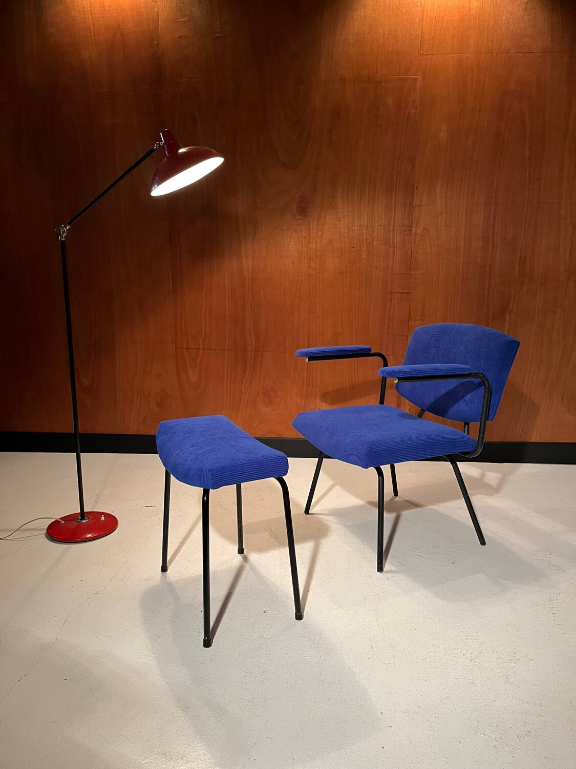 Vintage armchair and its footrest from around 1950.