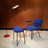 Vintage armchair and its footrest from around 1950.