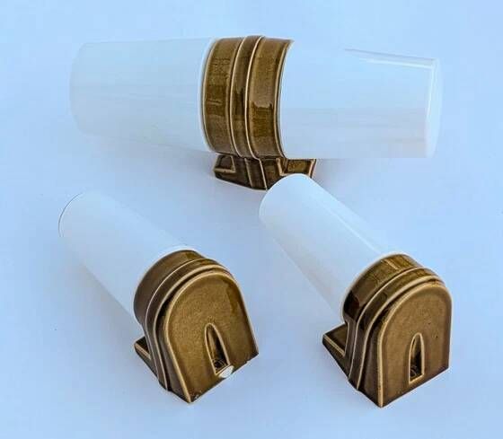 3 ochre porcelain wall sconces from the 1960s (models 6065 and 6080) by Sigvard Bernadotte for Ifö.