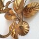 Apply gold metal sheets, Hans Kolg