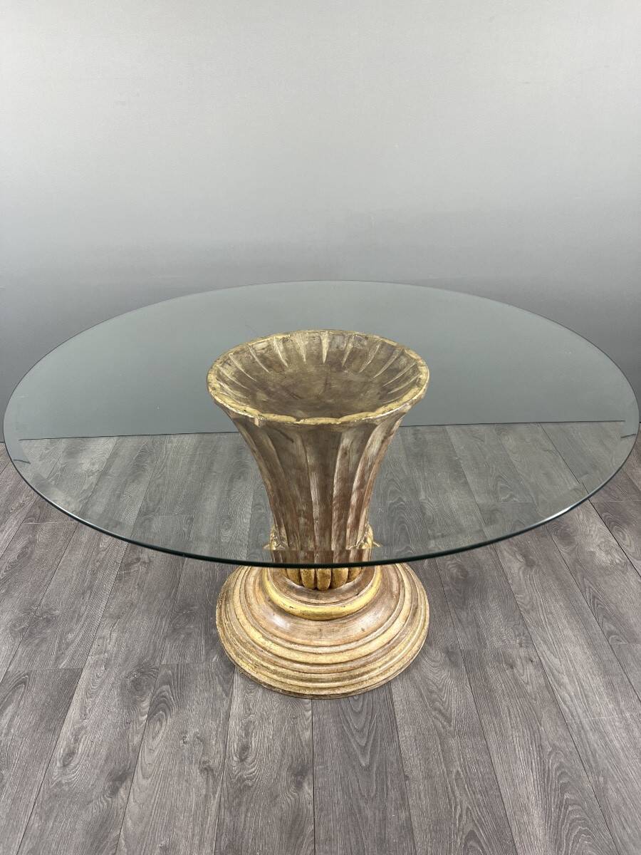 Table with a central carved wooden base, 20th century