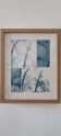 Wall-mounted collage cyanotype photograph