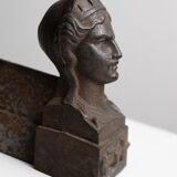 Pair of ancient cast iron chenets adorned with bust of Marianne