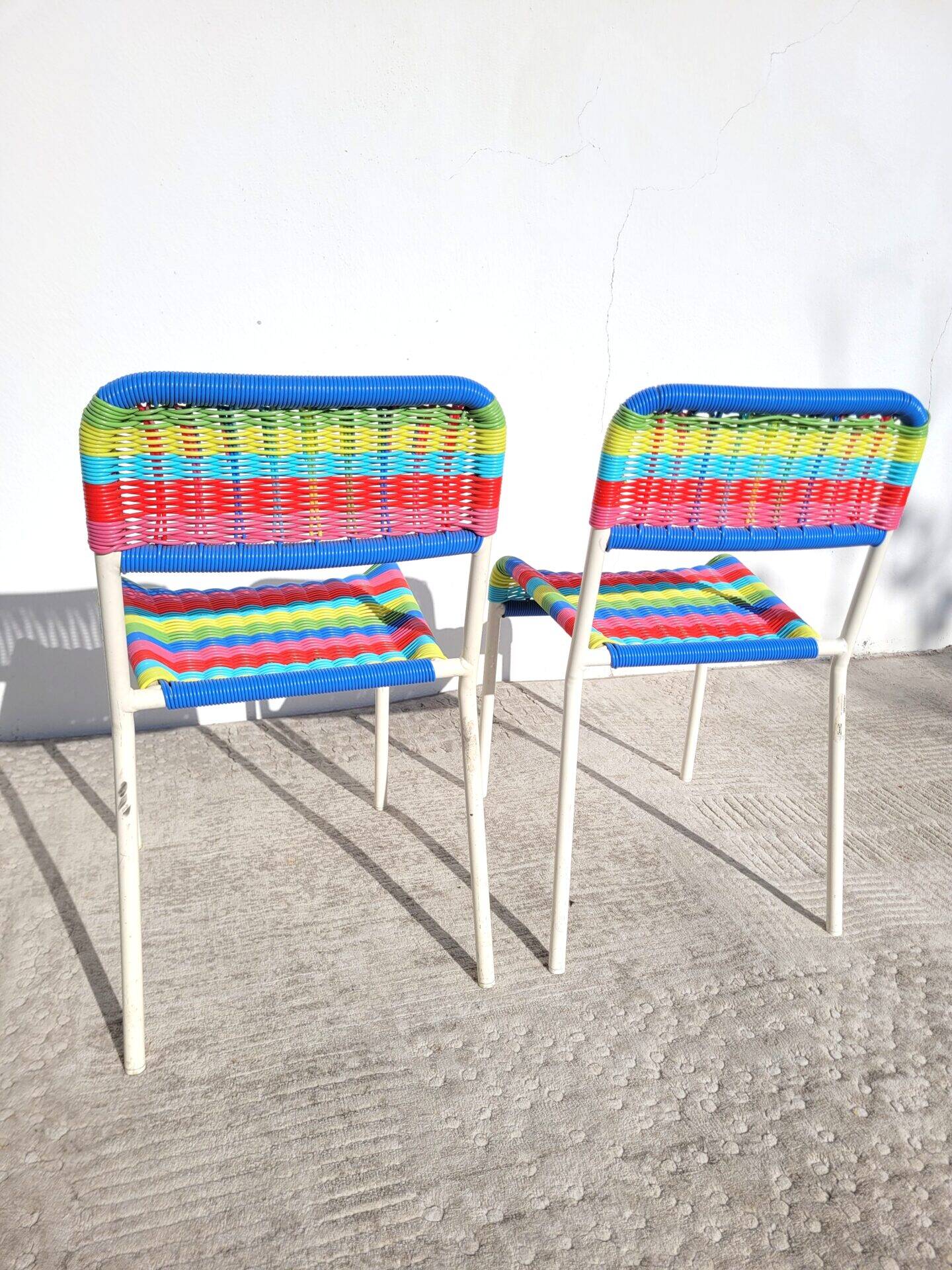 Pair of children's chairs with Ikea Fargglad scoubidou pattern