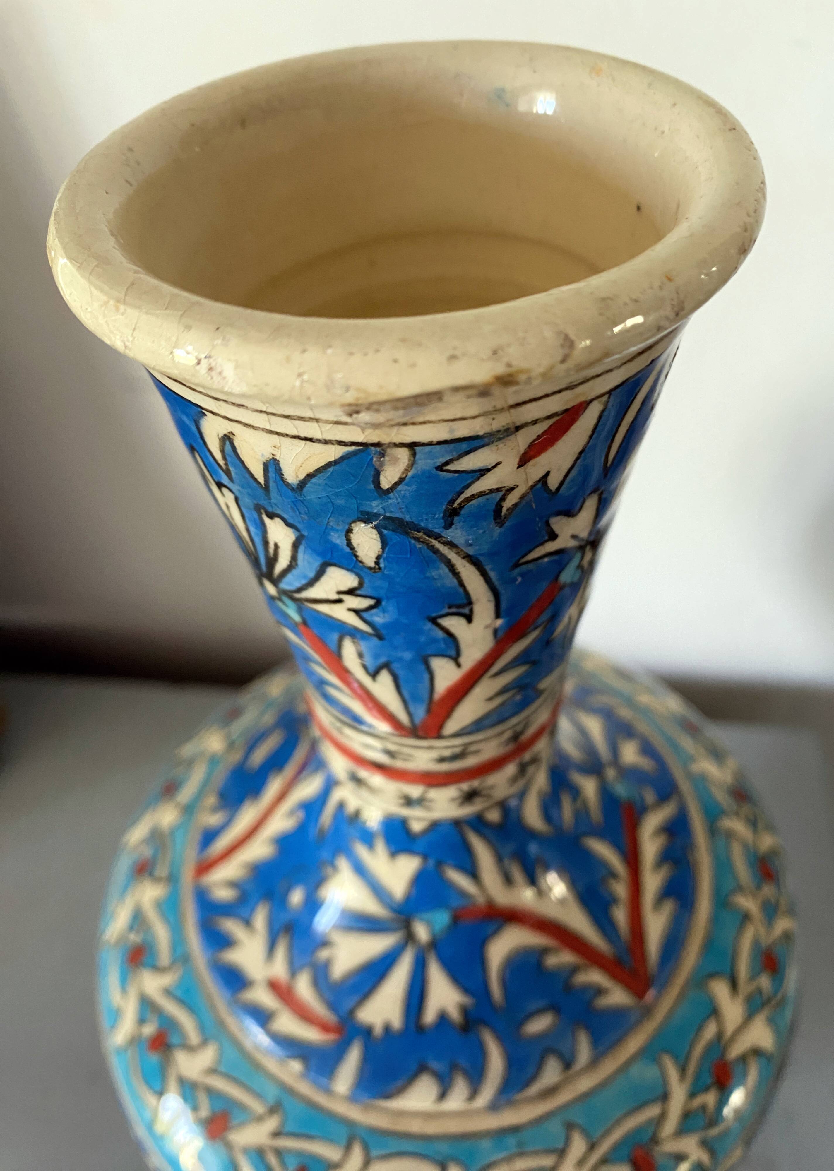 Iznic ceramic vase with blue interlacing