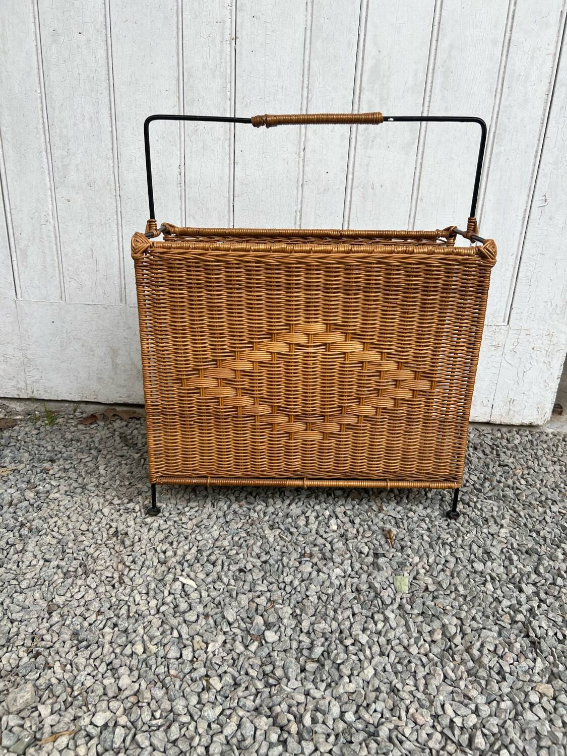 Vintage rattan and black metal magazine rack