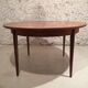 Scandinavian round table in rosewood veneer
