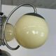 Lampe suspendue chromée art déco