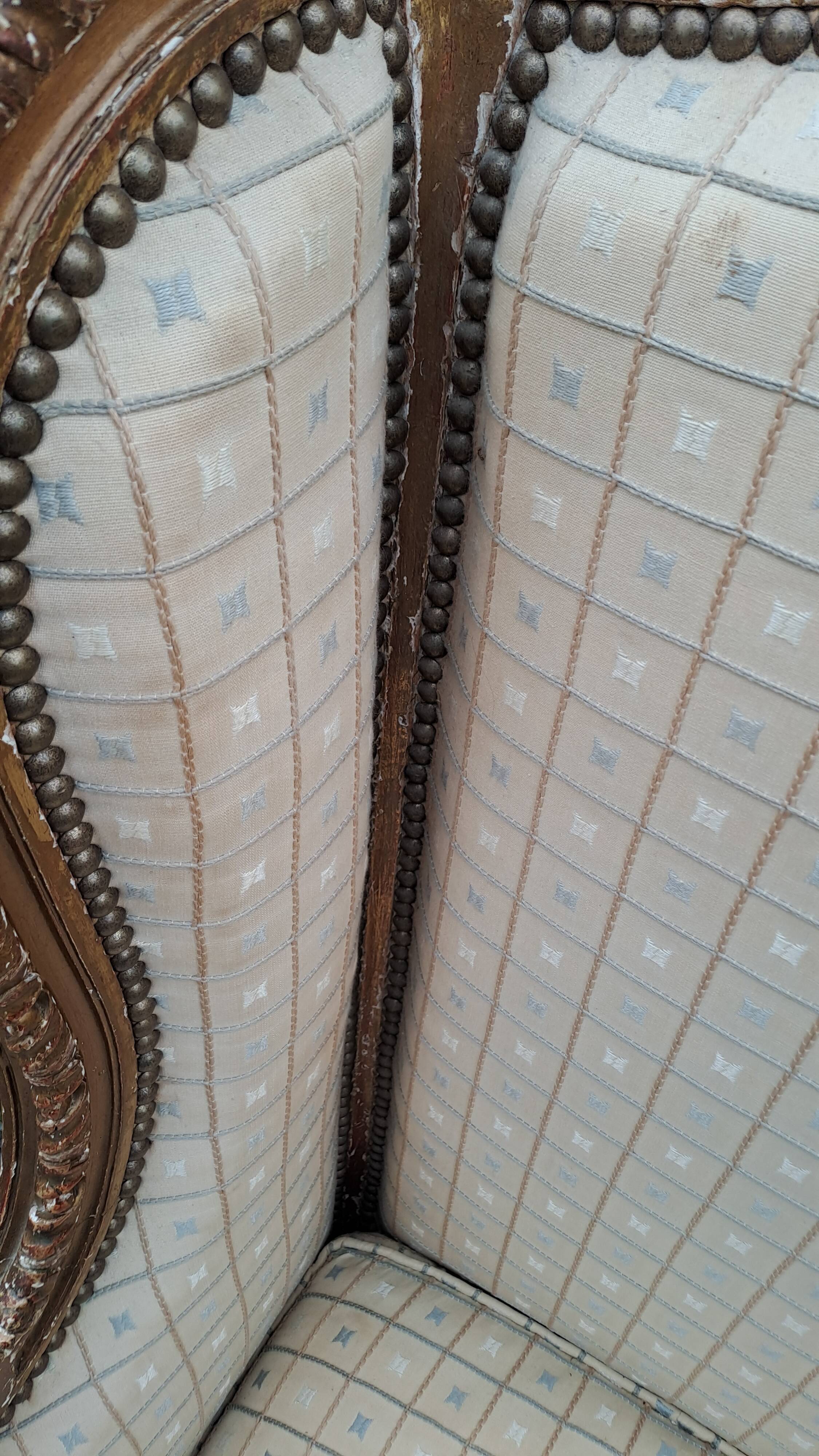 Pair of restored Louis XV wingback armchairs – new fabric
