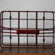 Red metal bottle holder