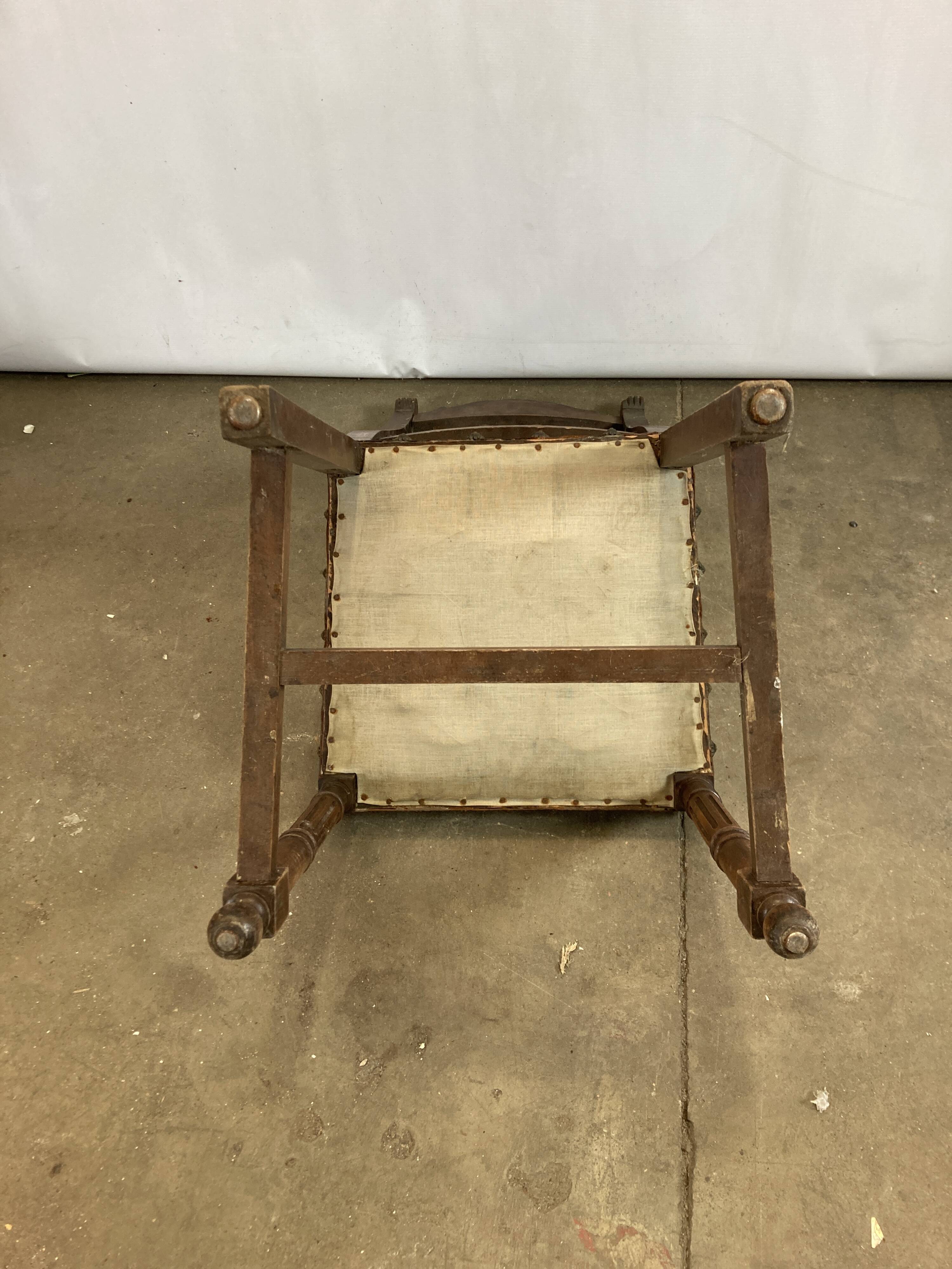 Pair of Henry II wooden and leather chairs