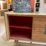 Rattan sideboard with ceramics