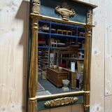 Empire-style mirror in gilded wood