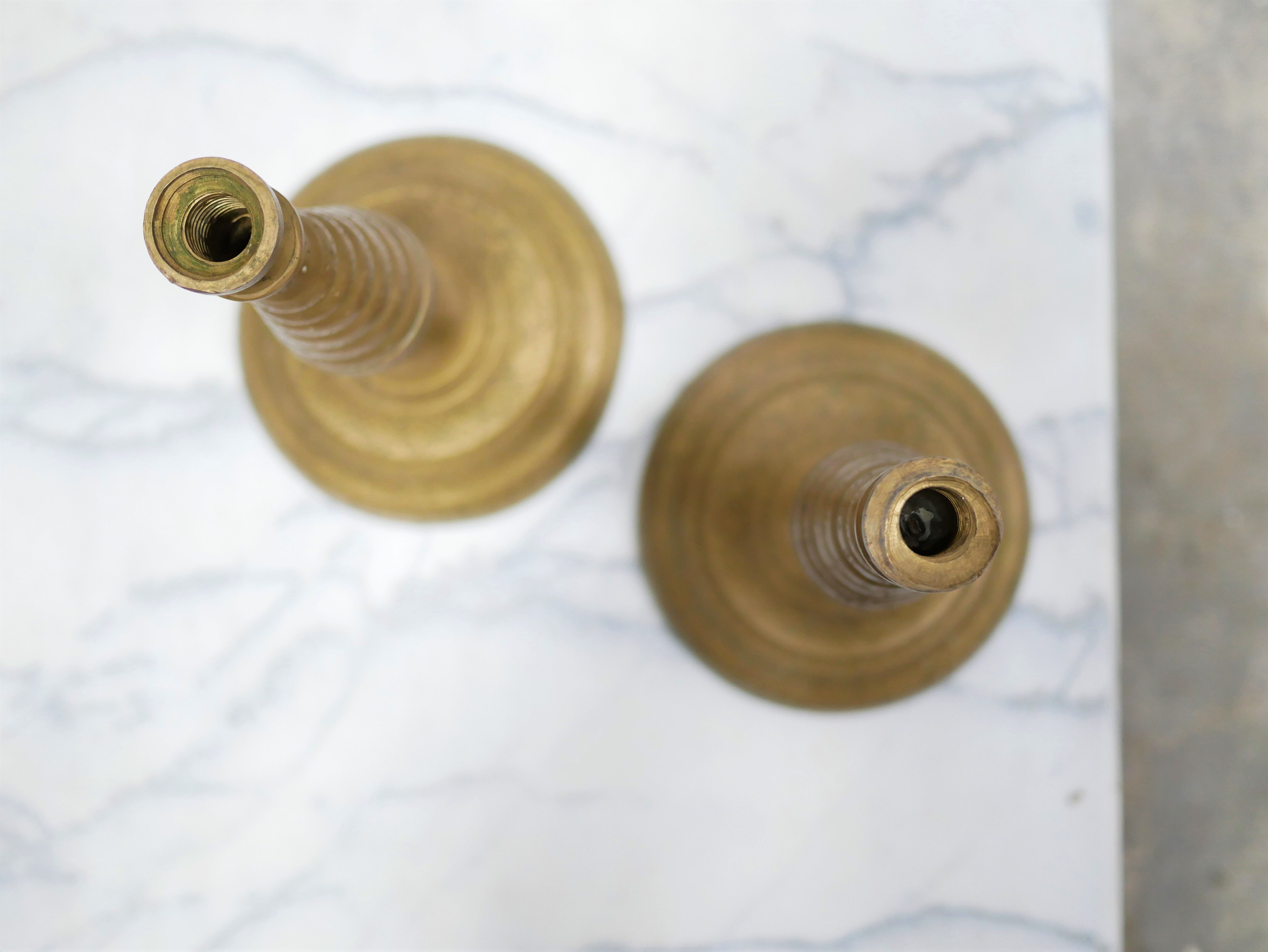 Pair of vintage candle holders in golden brass