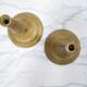 Pair of vintage candle holders in golden brass