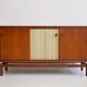 Buffet Ilmari Tapiovaara in teak with fabric and brass details.
