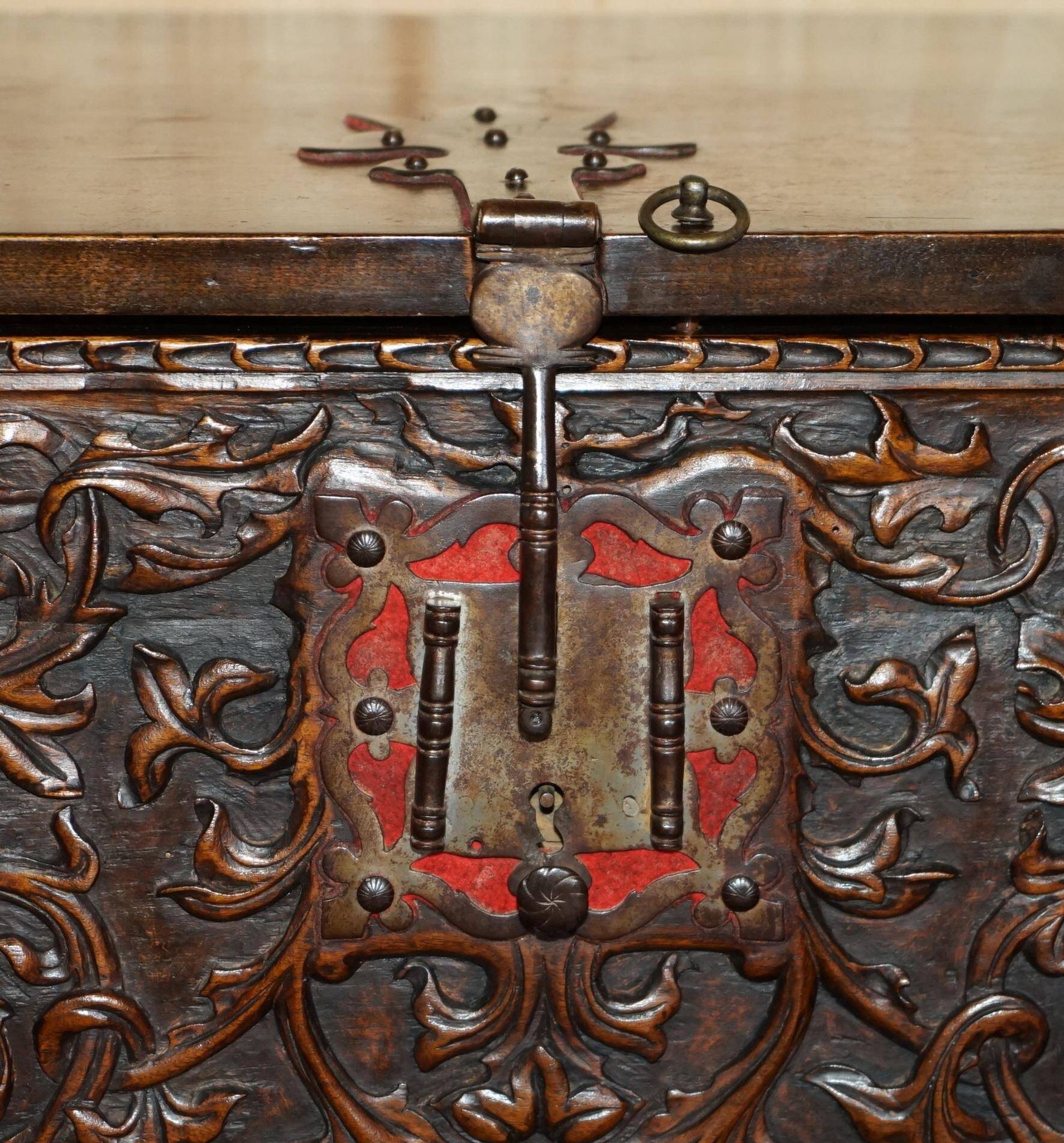 18th-century carved Spanish cabinet with hidden storage.