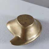 Vintage brass ashtray with an organic design from the 1950s.